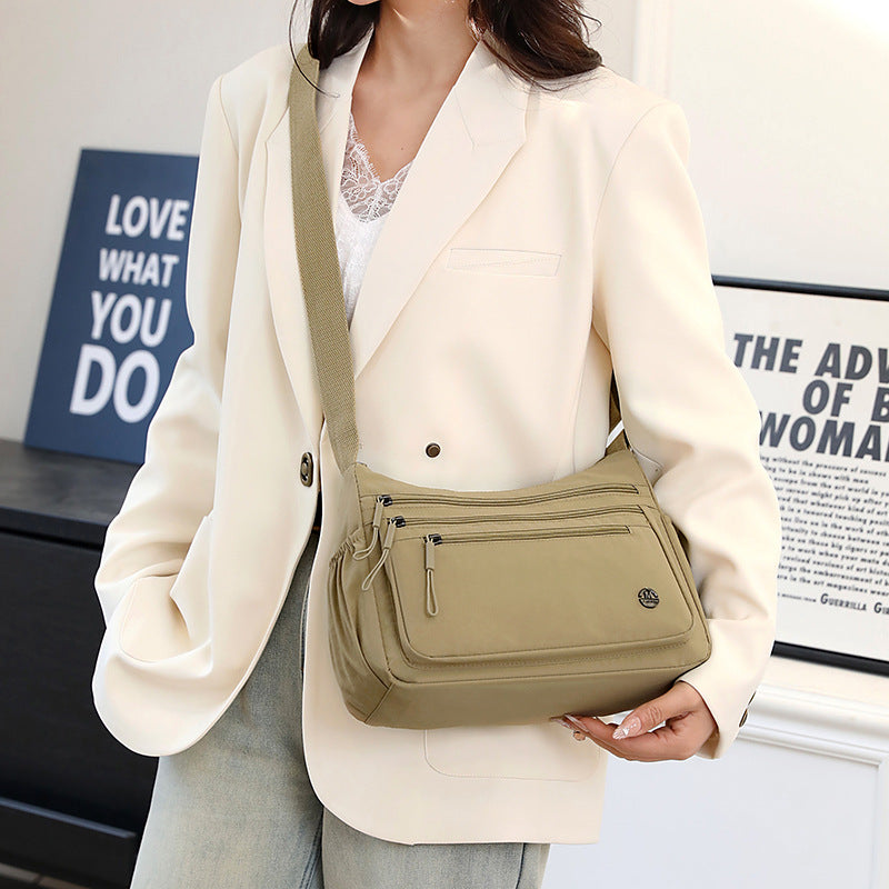 Foreign trade large-capacity casual women's bag 2025 new multi-compartment lightweight shoulder bag fashionable nylon simple messenger bag