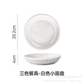 Small white disc
