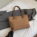 Korean style vintage shoulder bag - women's niche design, embossed texture, underarm bag, large capacity tote