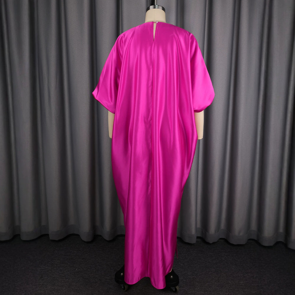 African-inspired loose fit lantern sleeve maxi dress - round neck, cinched waist, flowy hem, solid color party dress