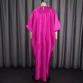 African-inspired loose fit lantern sleeve maxi dress - round neck, cinched waist, flowy hem, solid color party dress