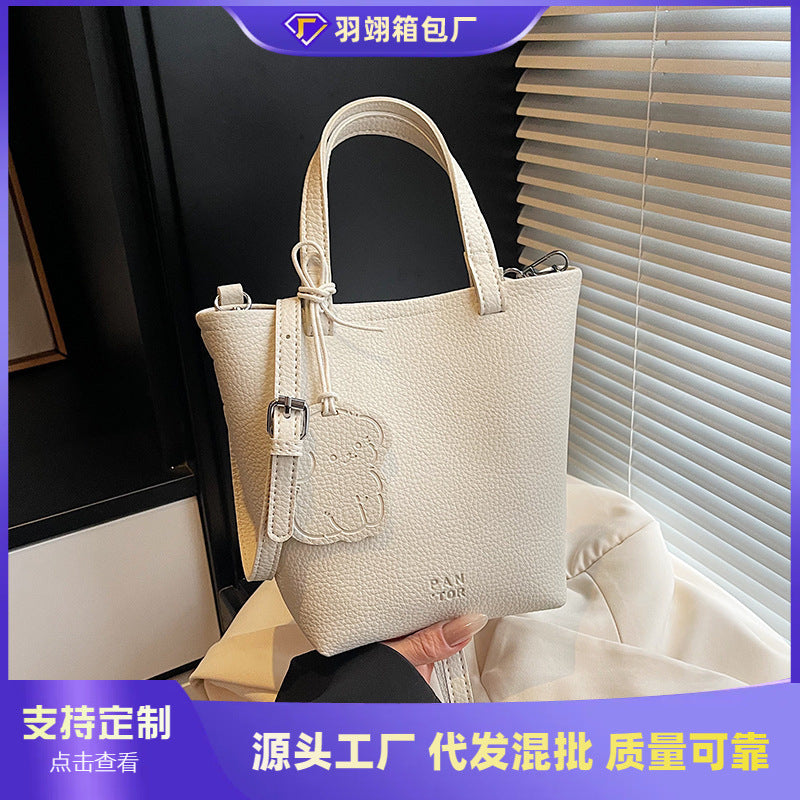 Cross-border simple casual portable bucket bag women's 2025 new fashion shoulder bag commuter versatile messenger bag