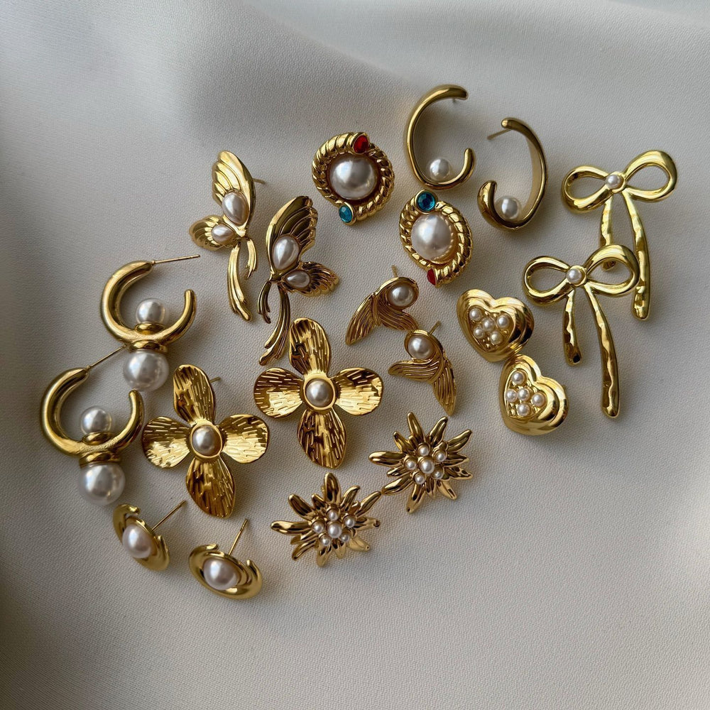 Wholesale pearl stud earrings for women - european and american fashion, statement earrings with a high-end feel, geometric irregular flower and heart earrings for women