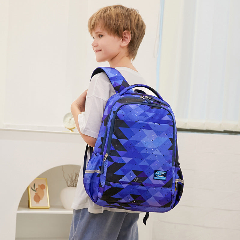 School bag for primary school students Korean version of children's backpack to reduce the burden and protect the spine, large capacity boys and girls first, second and third grades backpack