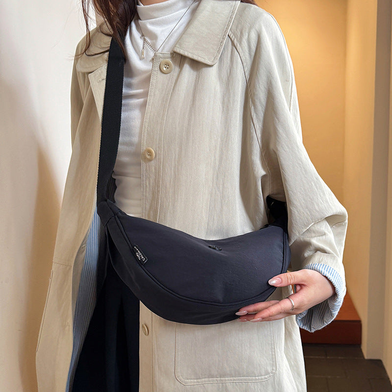 Spring casual macaron color dumpling bag 2026 new versatile crossbody bag women's korean style commuter shoulder bag
