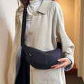 Spring casual macaron color dumpling bag 2026 new versatile crossbody bag women's korean style commuter shoulder bag