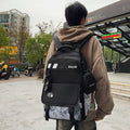 New trendy graffiti backpack - high-value anime cartoon design, large capacity, lightweight, waterproof student backpack