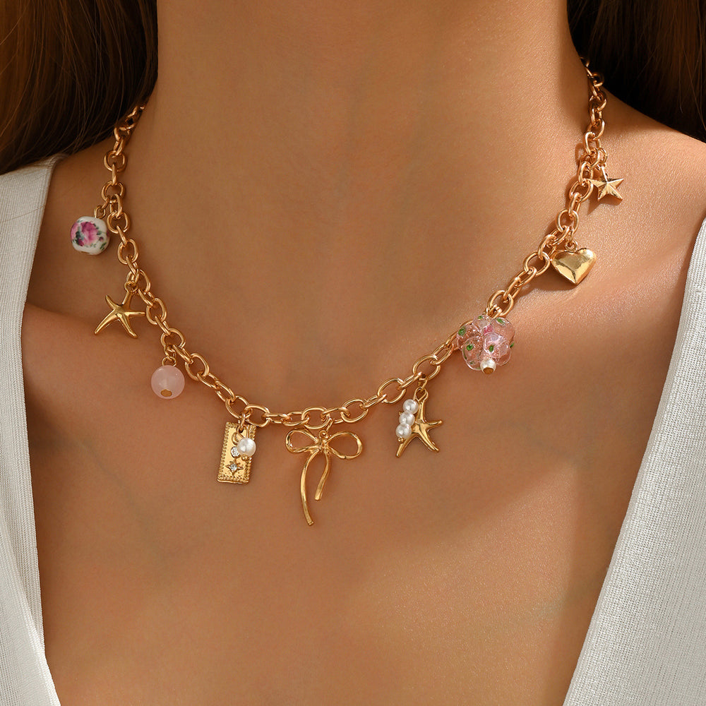 Wholesale bowknot necklaces, cross-border new floral heart pendants, women's niche high-end ceramic bead bracelet accessories