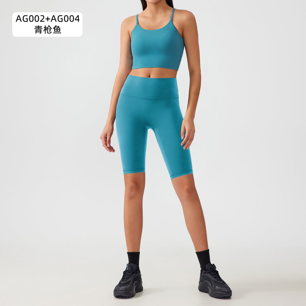 Two-piece yoga outfit set for women: high-waisted, butt-lifting yoga shorts with barely-there, supportive, shock-absorbing sports bra