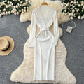 Minimalist chic solid color knit dress - women's autumn collection: criss-cross neck, belted waist, slim fit, stunning maxi dress