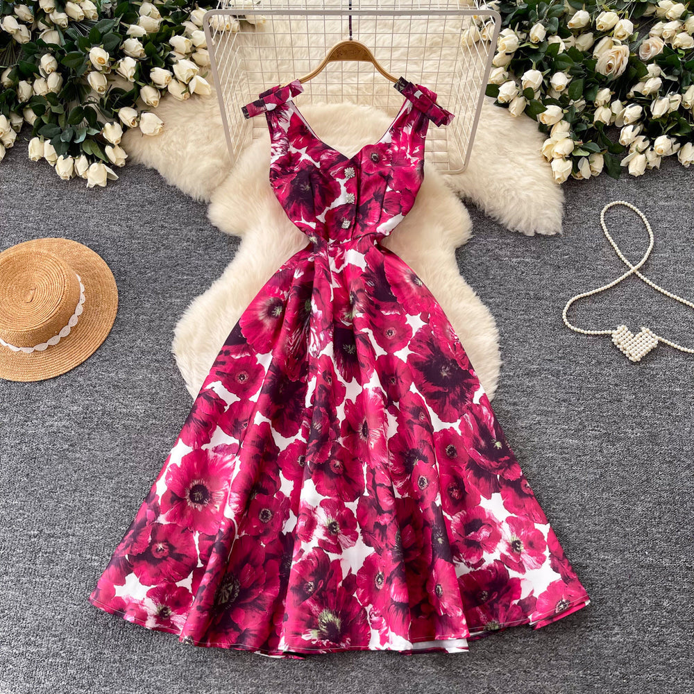 High-end floral print sleeveless dress for women, perfect for summer. elegant, high-waisted, and figure-flattering a-line silhouette, ideal for a sophisticated vacation look