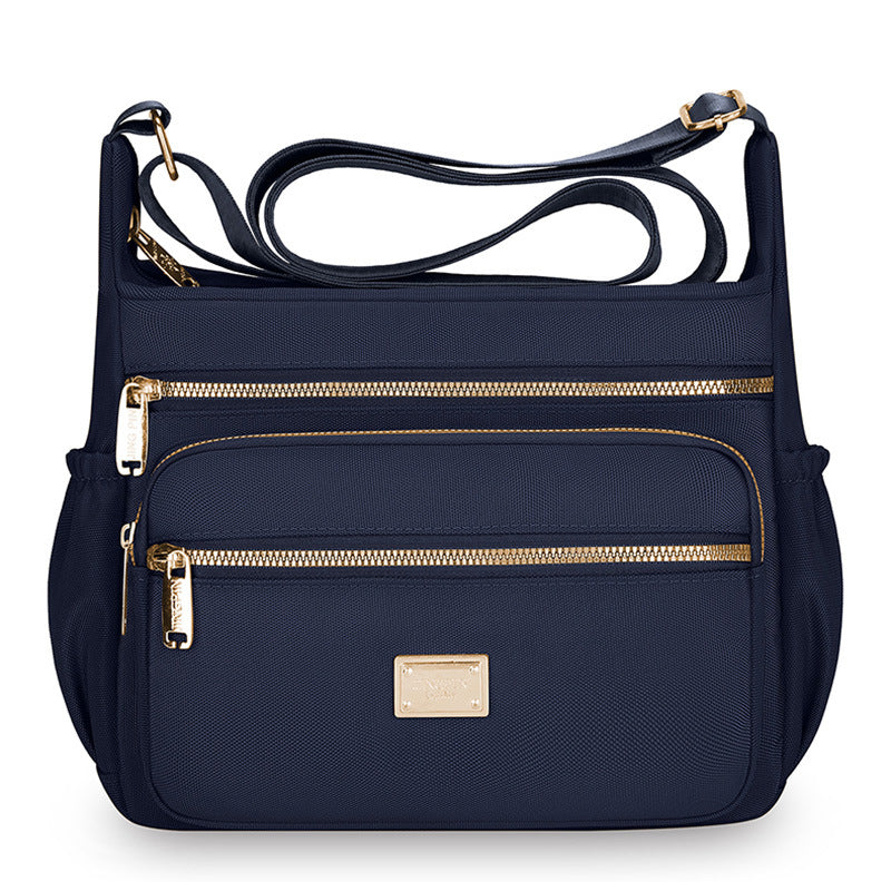 Women's bags are fashionable and simple, large-capacity messenger bags, multi-layer storage, travel shoulder bags, going out for commuting, middle-aged mother bags.