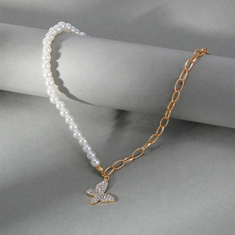 Wholesale korean-style necklace: trendy ins jewelry for autumn/winter. versatile, diamond-studded butterfly pearl sweater necklace with a chic, chanel-inspired design for women