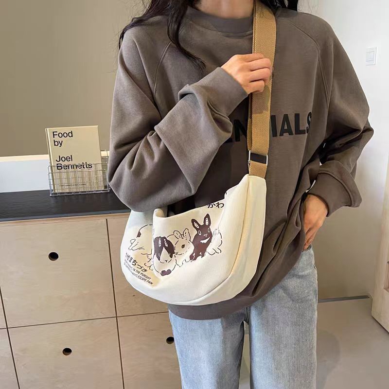 Niche style canvas bag for women 2024 spring and summer new arrivalcasual large capacity student shoulder work clothing bag crossbody dumpling bag