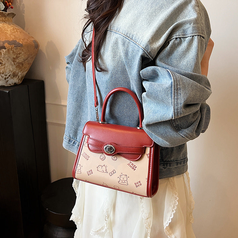 Simple contrasting color small bag women's 2025 summer new portable small square bag advanced super fire niche texture messenger bag