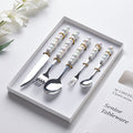 Luxury ceramic handle cutlery set - high-end stainless steel dinnerware gift box for home use - western style knives, forks, and spoons - perfect for gifting
