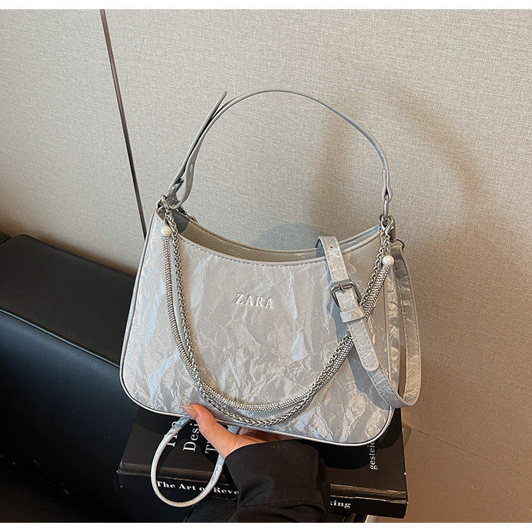 High-end women's bag, large capacity, 2025 new style, niche design, shoulder bag, crossbody bag, understated luxury, textured, commuter tote bag