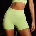 Solid color versatile seamless cycling capri leggings - women's quick-dry high-waisted butt-lifting yoga & fitness shorts