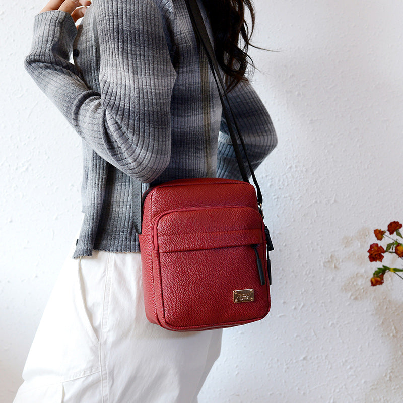Simple soft leather texture messenger bag women's fashion retro versatile commuter small square bag layered storage going out shoulder bag
