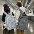 Niche style american graffiti junior high school and college students large capacity backpack stylish checkerboard grids high school student backpack