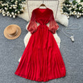 Elegant court-style bubble sleeve dress - women's autumn tassel design, mature and chic, flowy maxi dress