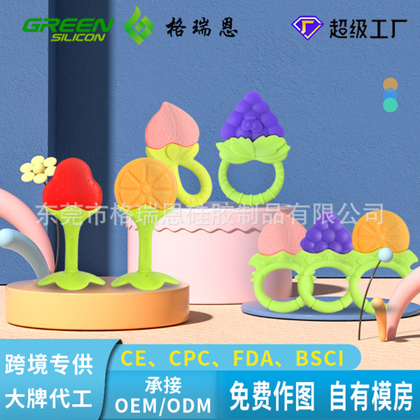 Baby fruit toothpaste baby molar stick food grade silicone biting glue manufacturer two-color three-dimensional strawberry biting music