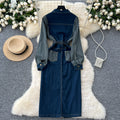 French-inspired, niche long-sleeved striped denim dress with a collared neckline, metal button detailing, a fitted waist, and a stylish slit