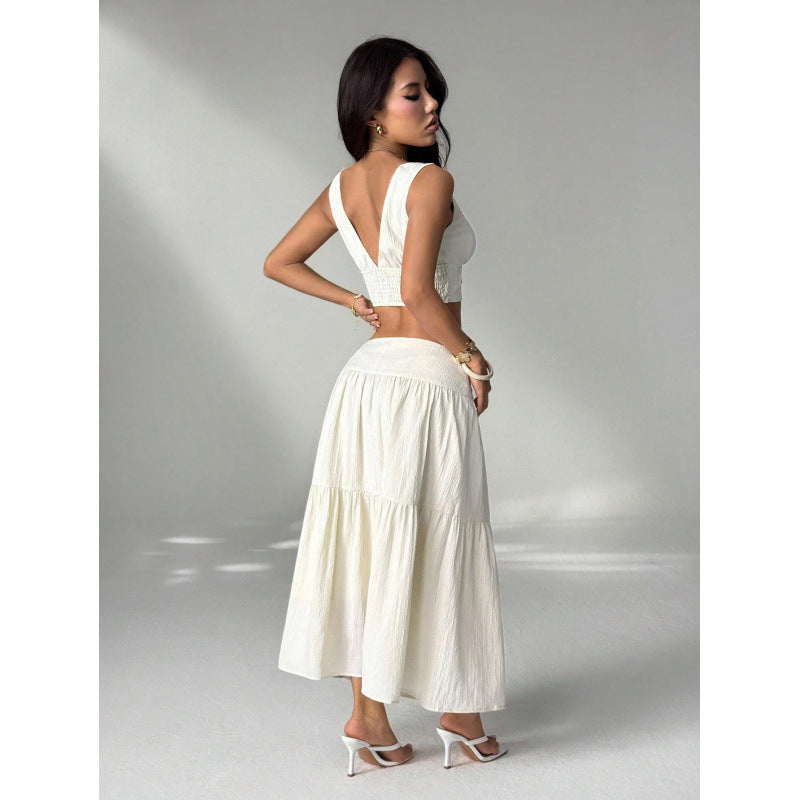 Women's embroidered v-neck sleeveless top and high-waisted a-line maxi skirt two-piece set, perfect for a stylish vacation look