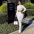 European and american cross-border women's fashion:  autumn new arrivals - solid color stand collar long sleeve top with cinched waist pleated sexy midi skirt