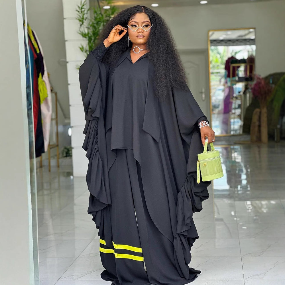 African-inspired loose fit batwing sleeve top and color block striped wide leg pants two-piece set