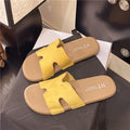 French open-toe flip-flops women's outerwear 2025 summer new style vacation flat anti-slip beach sandals
