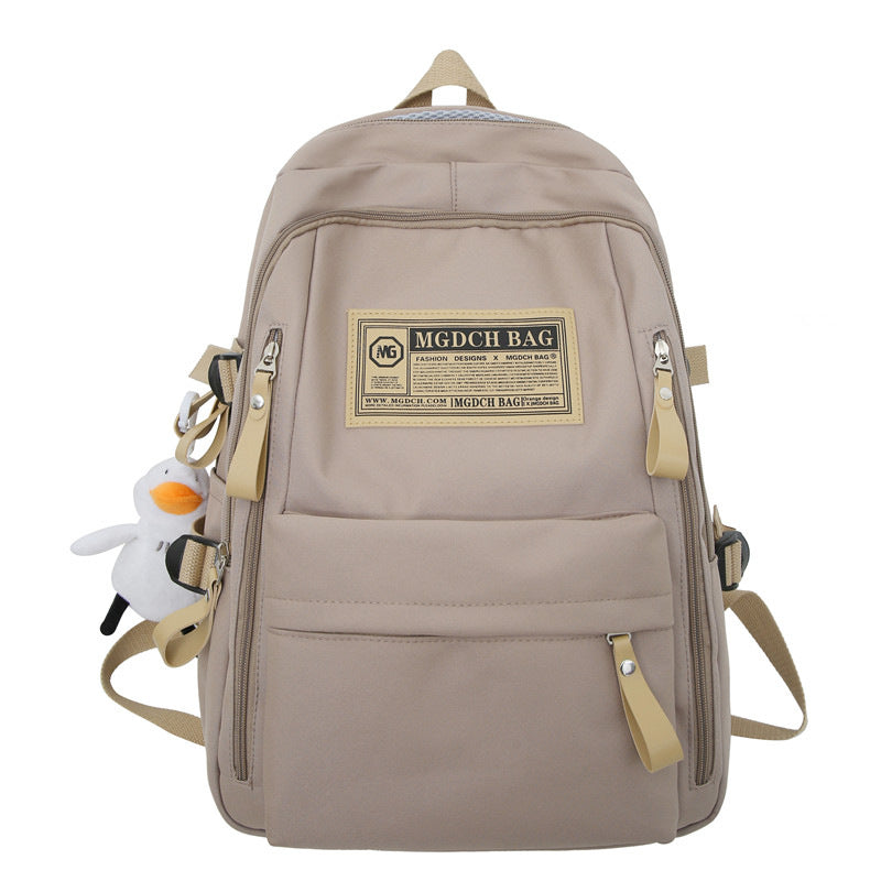 Spring and summer simple travel backpack computer backpack casual solid color ultra-light junior high school students large-capacity schoolbag