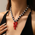 Processed personalized crayfish pendant european and american cross-border seaside necklace for women niche black and white beaded high-end clavicle chain