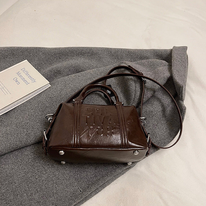 Cross-border simple casual handbag bag women's 2025 new versatile shoulder messenger bag fashionable commuter pillow bag