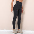Big sale cross-border new arrival washed yoga pants with holes cut out seamless high waist sports nine-point pants butt lift fitness pants for women