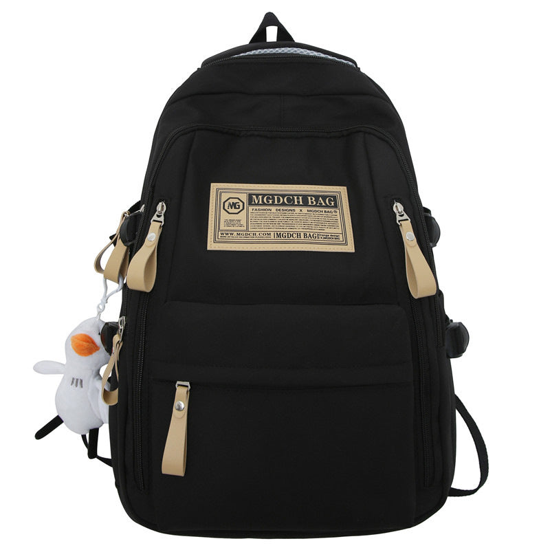 Spring and summer simple travel backpack computer backpack casual solid color ultra-light junior high school students large-capacity schoolbag