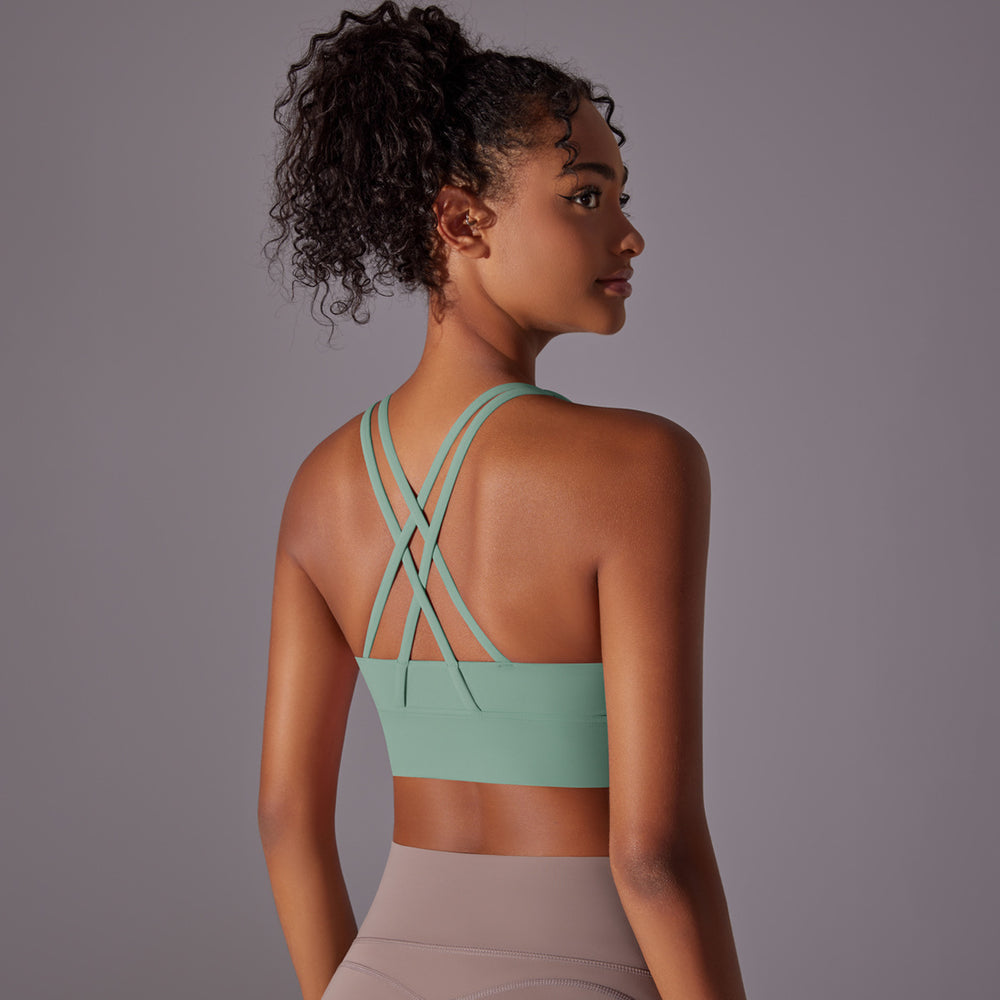 Fashion nude yoga vest women's cross back sports intimates bubble wrap push up seamless one-piece cup fitness bra