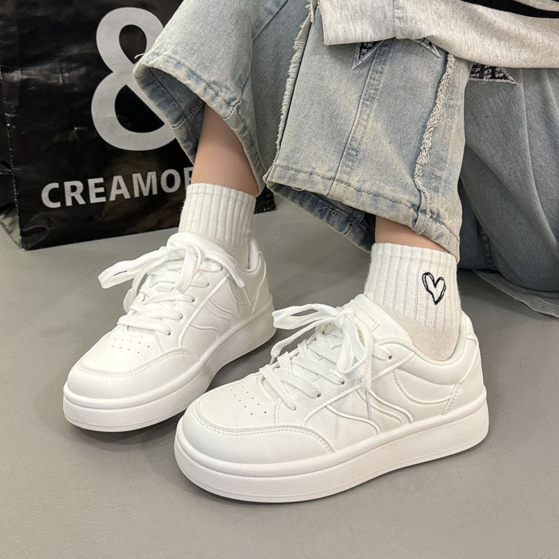 Vintage-inspired, niche white skate shoes with an "instagrammable" aesthetic. new for spring 2026, these versatile white sneakers are the perfect casual footwear