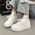 Vintage-inspired, niche white skate shoes with an "instagrammable" aesthetic. new for spring 2026, these versatile white sneakers are the perfect casual footwear