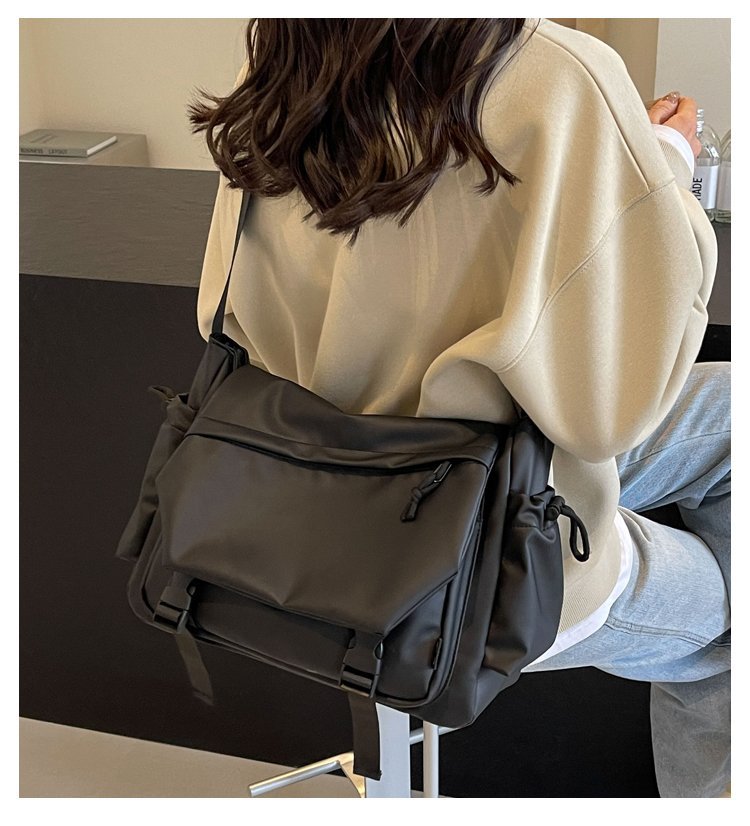 Cross-border popular trendy brand men's and women's messenger bags, locomotive bags, leather film shoulder bags, fashionable and versatile students, class mailman bags