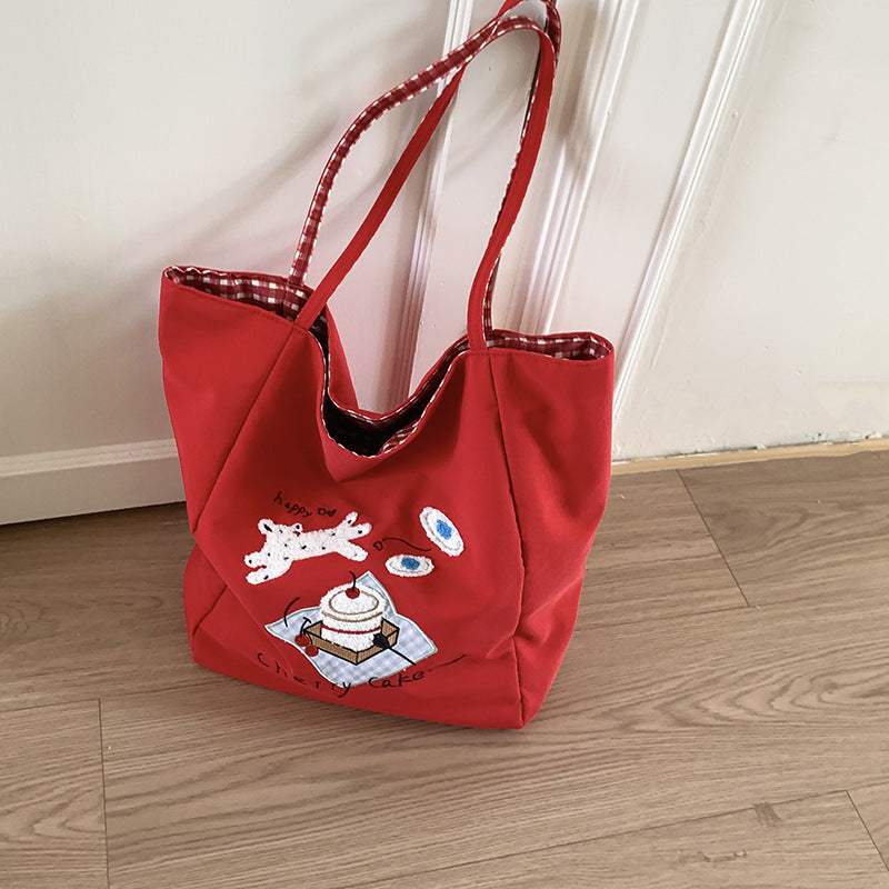 Canvas bag 2025 new women's handheld cloth bag large capacity carrying book bag junior high school students tutoring embroidered shoulder bag