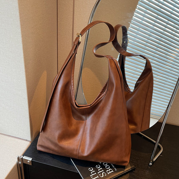 Winter popular oil wax leather big bag women 2025 new fashion commuter tote bag retro large capacity armpit bag