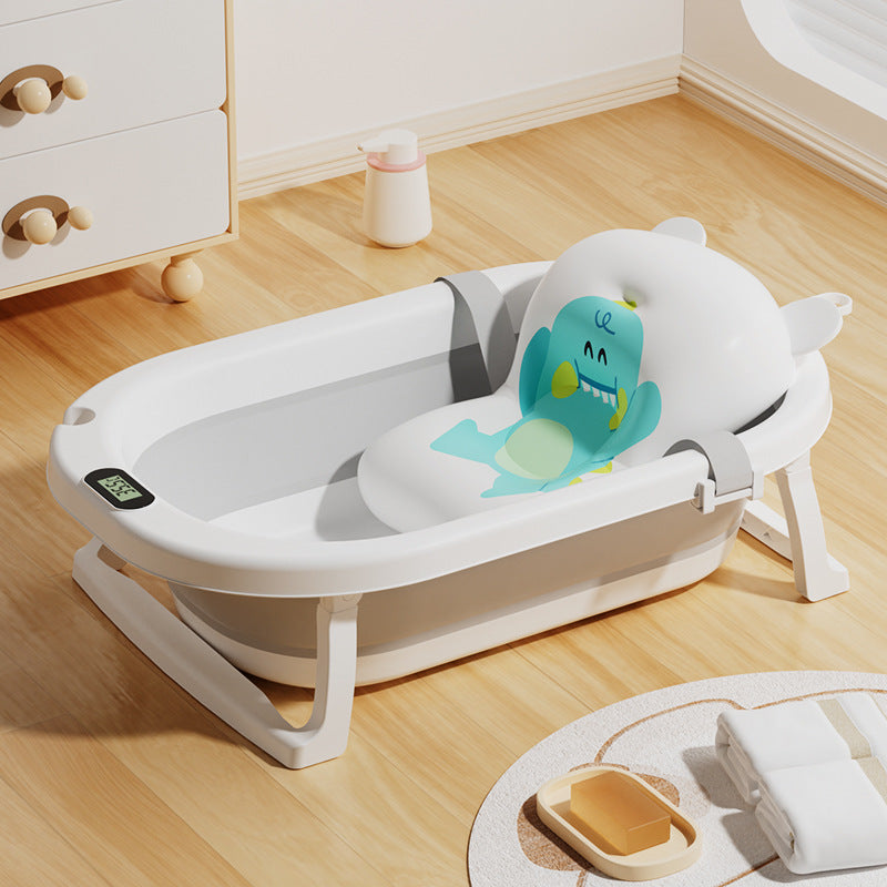 Newborn baby foldable bathtub with temperature-sensitive silicone plug, easy grip handles, and large capacity for baby bathing