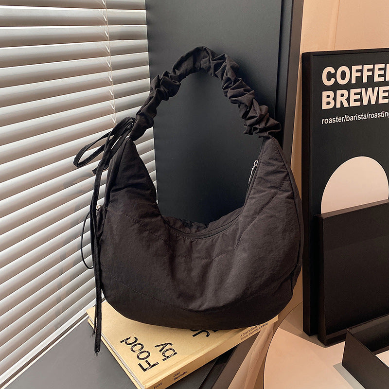 Fashion bag women's 2025 new college style dumpling bag casual large capacity shoulder messenger bag
