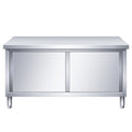 Commercial kitchen workstation: stainless steel countertop with sliding door, cutting board storage, and prep table for restaurants