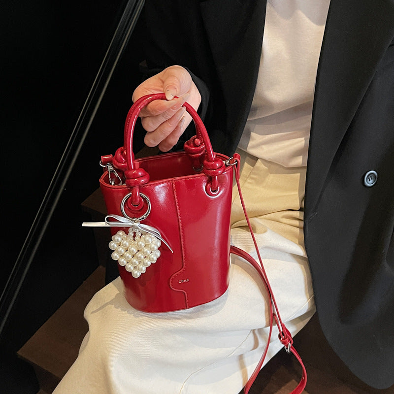 Cross-border high-end foreign-style handbag women's 2025 trendy niche design bucket bag popular versatile messenger bag