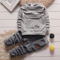 Spring/autumn kids' two-piece outfit set: hooded top and pants with large pockets for baby boys and girls. factory direct, ships in bulk