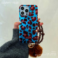 Blue and brown leopard print swirl case, compatible with apple 16 pro max, iphone 15, and iphone 14