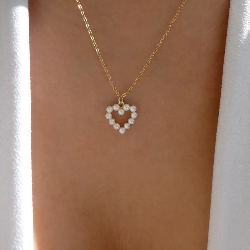 Wholesale heart necklaces: versatile european & american style jewelry, hollow-carved, diamond-accented, multi-layered alloy choker necklace - trendy ins style