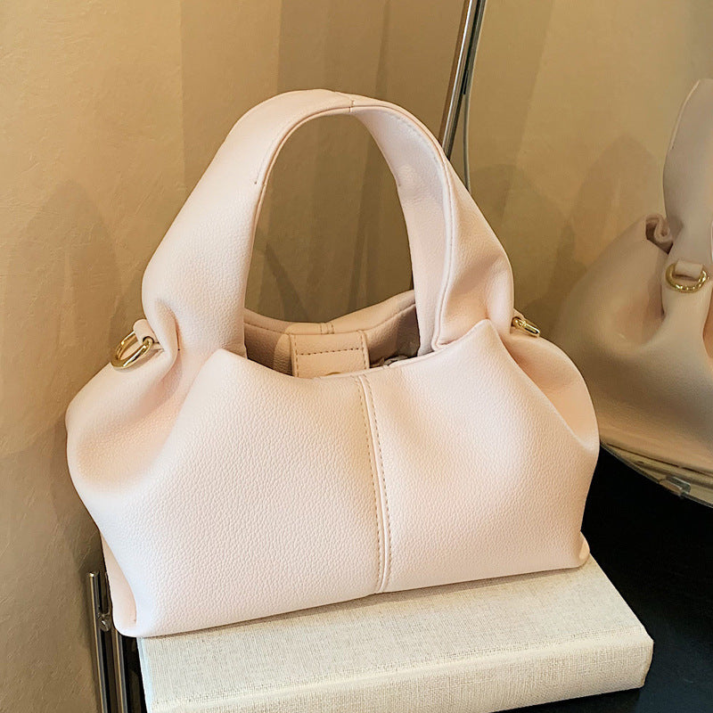 Cross-border women's cloud dumpling bag 2025 new popular portable lunch box bag French texture shoulder messenger women's bag